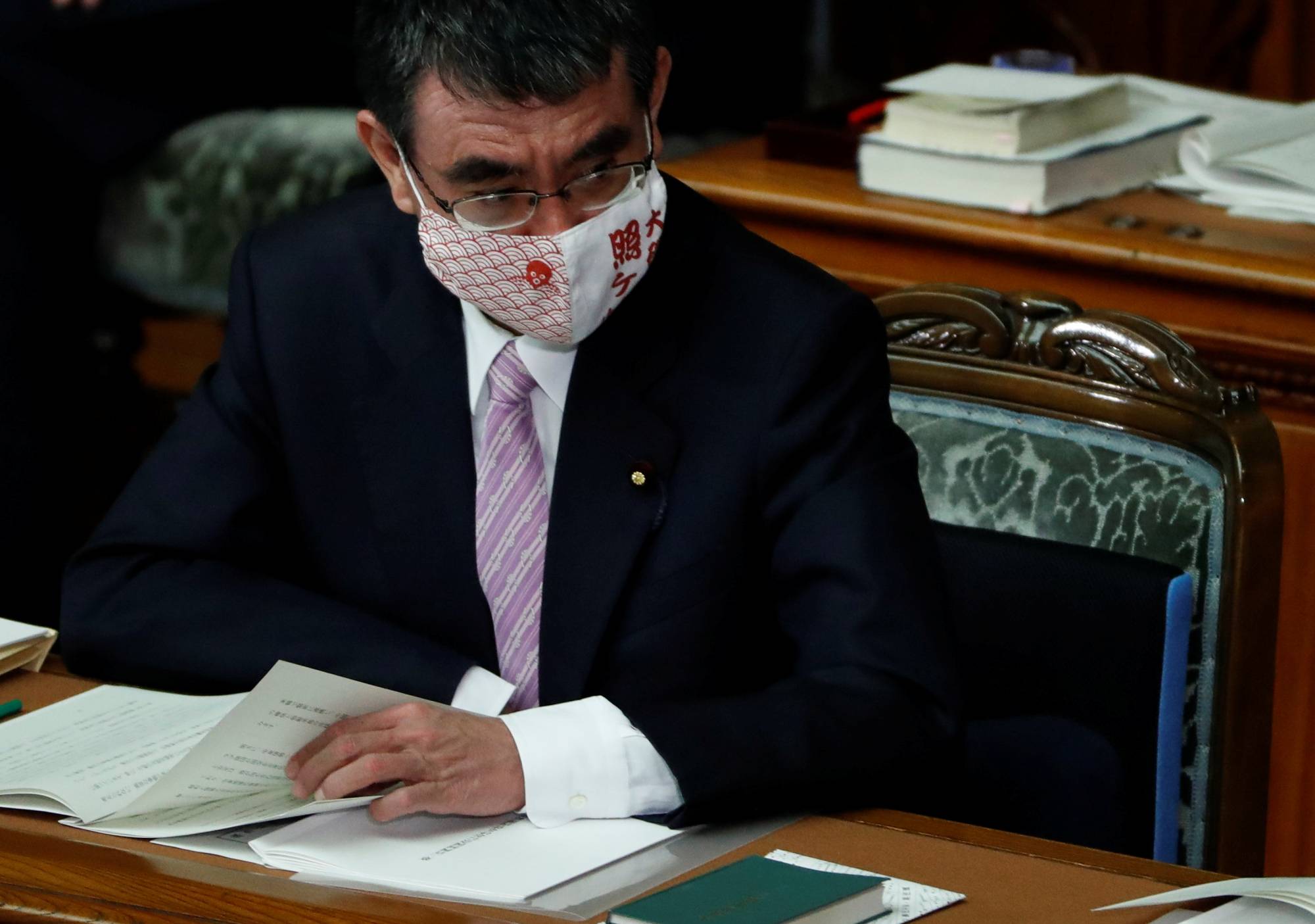 Administrative and regulatory reform minister Taro Kono attends the opening of an ordinary session of the Diet in Tokyo on Monday. | REUTERS